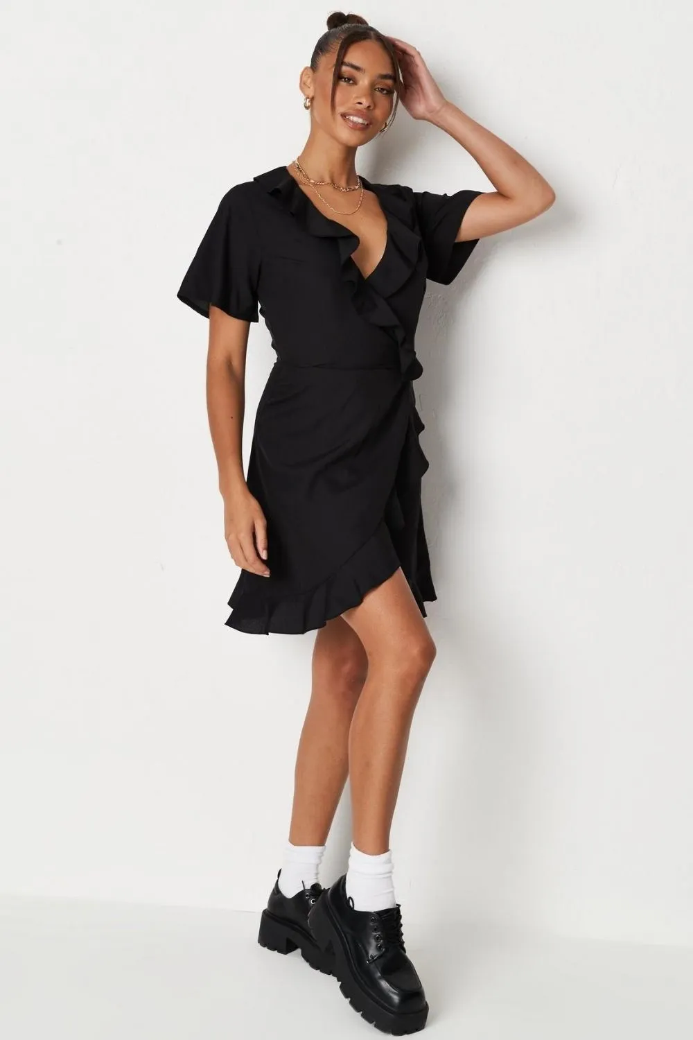 Black ruffle wrap over tea dress